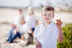 Cute Little Blonde Boy Showing Off His Starfish