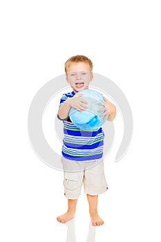 Cute little boy with blue ball