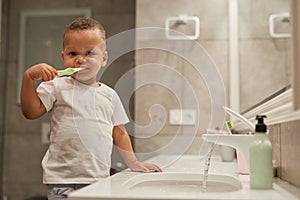Cute Little Boy Brushing Teeth