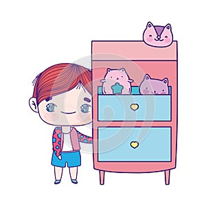 Cute little boy cartoon with drawers and toys cats