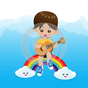 Cute Little boy child playing a music guitar on rainbow
