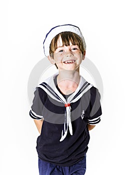 Cute little boy dressed in sailor suit