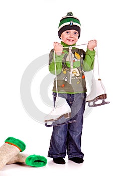 Cute little boy with figure skated