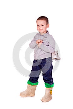 Cute little boy with figure skated