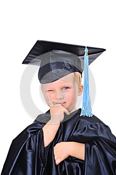 Cute little boy in gown