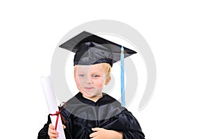 Cute little boy in graduation gown