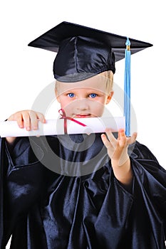 Cute little boy in graduation gown