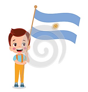 Cute little boy holding flag