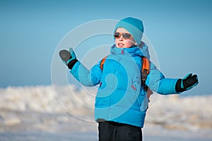 Cute little boy outdoors on cold winter day