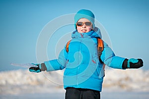 Cute little boy outdoors on cold winter day