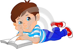 Cute little boy reading book