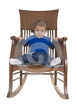 Cute little boy on rocking chair