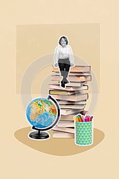 Cute little boy sitting on big book stack doing homework back to school concept have globe map markers for drawing