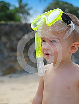 Cute little boy with snorkel gear