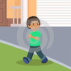 Cute little boy strolling around. Walking while whistling