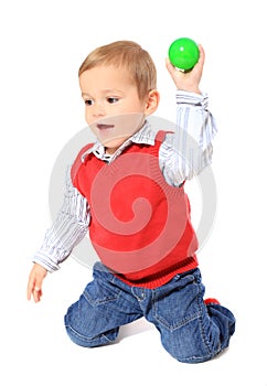 CUte little boy throwing ball