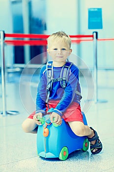 Cute little boy waiting in the airport