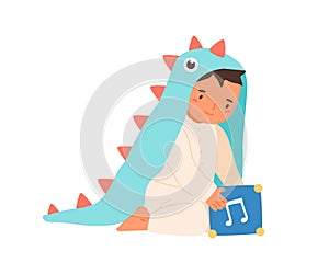 Cute little boy wearing dinosaur costume playing with music box vector flat illustration. Adorable toddler in romper