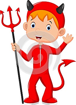 Cute little boy wearing a red devil costume