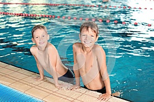 Cute little boys in indoor pool