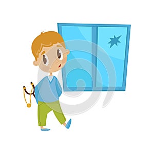 Cute little bully boy with a slingshot in front of crashed window, hoodlum cheerful kid, bad child behavior vector