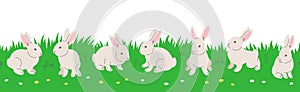 Cute little bunnies playing in green meadow seamless border pattern