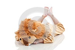 Cute little child dressed in lion suit