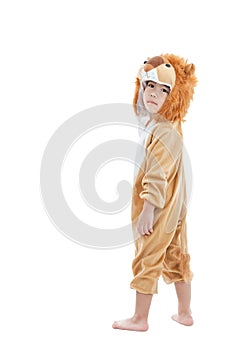 Cute little child dressed in lion suit
