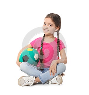 Cute little child with soft soccer ball. Playing indoors