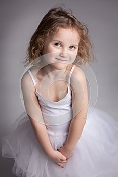 Cute little girl in a ballet dress