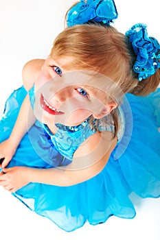 Cute little girl in ballroom dress