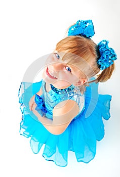 Cute little girl in ballroom dress