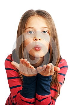 Cute little girl blowing on his hands