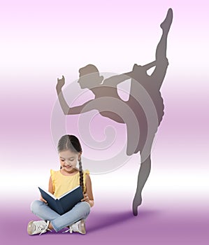 Cute little girl with book dreaming to be ballet dancer. Silhouette of woman behind kid`s back