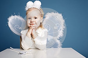 Cute little girl with butterfly costume