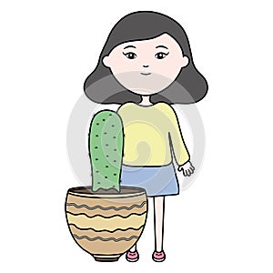 Cute little girl with cactus in ceramic pot