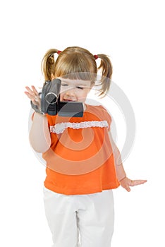 Cute little girl with camcoder photo