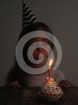 Cute little girl celebrates birthday.