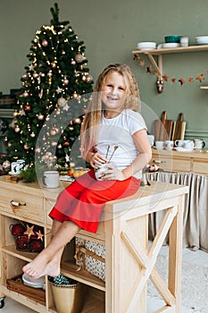 Cute little girl with christmas present