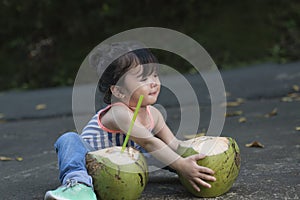Cute Little Girl With coconut