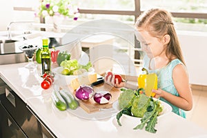 Cute little girl cooking