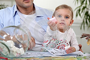 Kid eating marshmallows