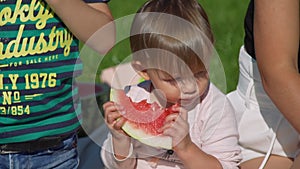 Cute Little Girl Eating Watermelon Outdoors