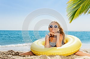 Cute little girl enjoying holidays at the seaside