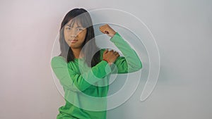 cute little girl in green t-shirt  on white background