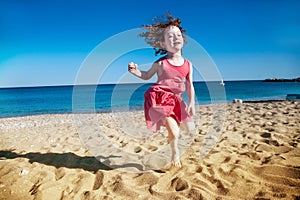 Cute little girl happy at seaside