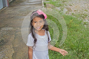 Cute little girl having fun at countryside.