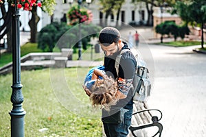 Cute little girl in her father`s arm