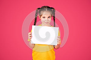 Cute Little Girl Holding Blank Placard With Copy Space For Advertisement