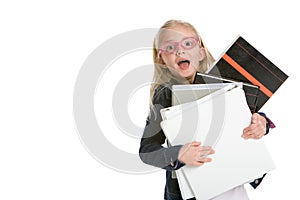 Cute little girl holding books isolated on white